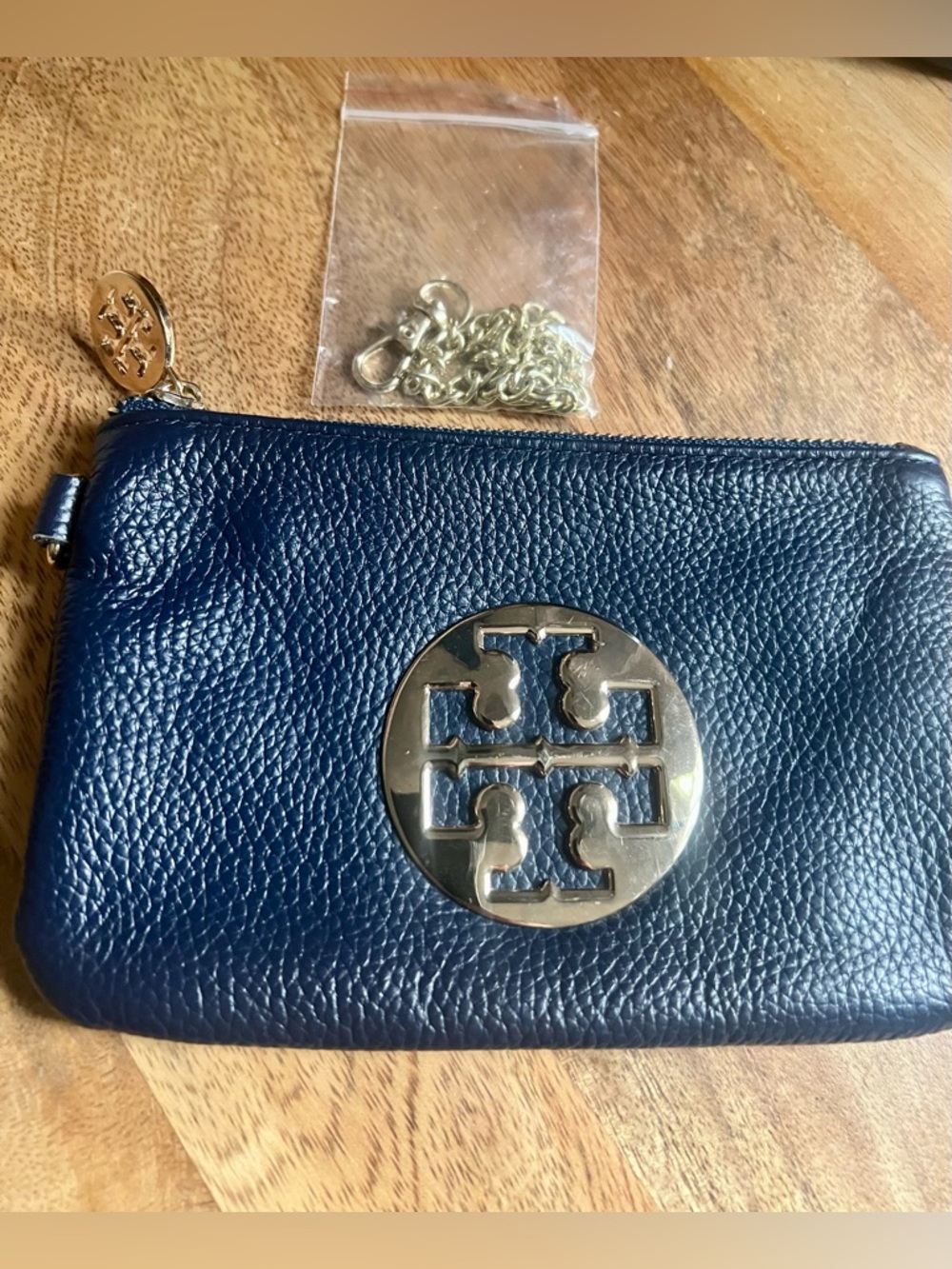 Tory Burch Navy Pebbled Leather wristlet  with Gold Emblem
